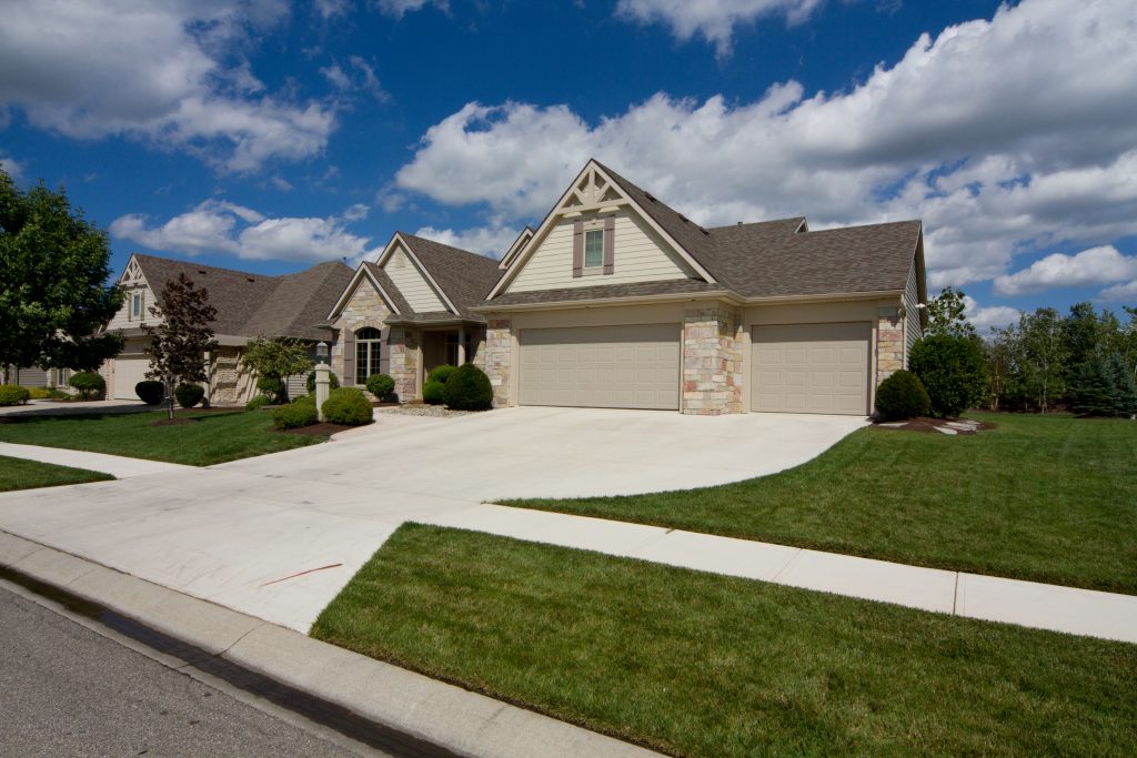 2026 Exterior Paint Colors A Northern Indiana and Southwest Michigan Homeowner’s Guide image of 2 homes with a combination of khaki, tan, and grey color palettes